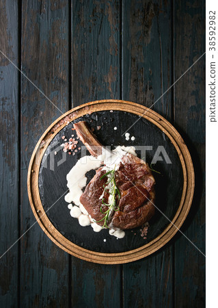 Grilled tomahawk steak 38592982