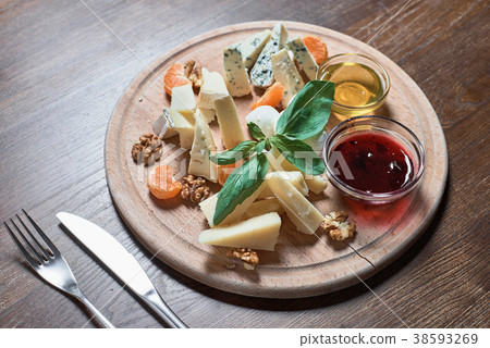 Cheese plate with cheeses on the table from 38593269