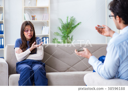 Psychologist counselling woman beaten by husband Psychologist counselling woman beaten by husband 38596188