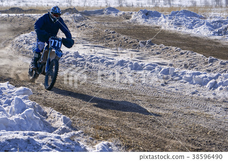 Sportsman racer man fulfills a fast ride Sportsman racer man fulfills a fast ride 38596490