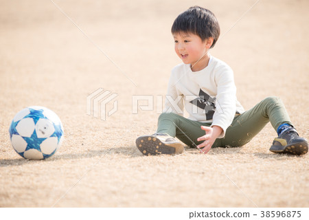 Soccer ball and a boy 38596875