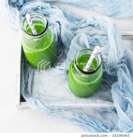 Healthy food concept green spinach smoothie  38596965