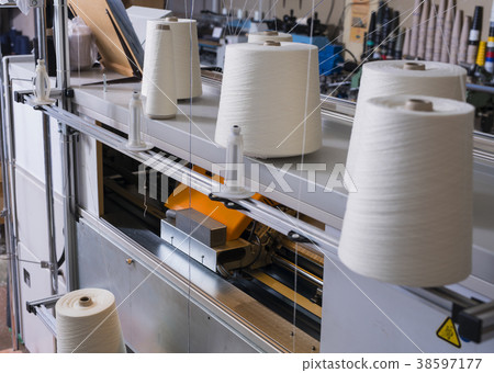 Spools with thread at knitting shop view 38597177