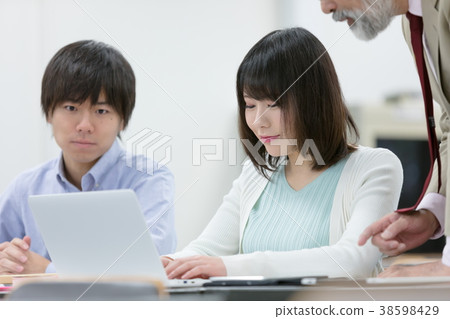 Female university student university teacher male and female campus life lecture room 38598429