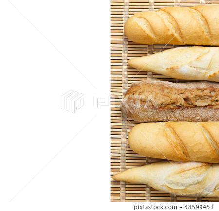 baguette of whole wheat bread on white background 38599451
