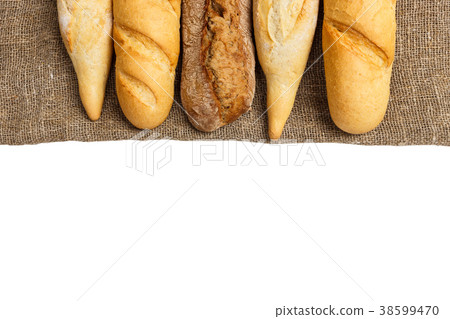 baguette of whole wheat bread on white background 38599470