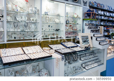 Souvenir shop with pearl jewelry. 38599950