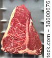 Top view of a raw fresh prime T-bone beef steak. 38600676
