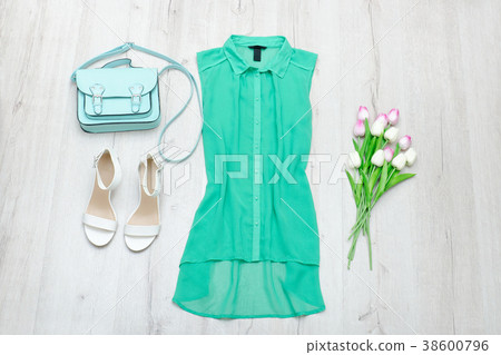 Green blouse, white shoes, mint bag and bouquet Green blouse, white shoes, mint bag and bouquet 38600796
