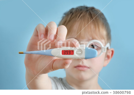 Woman with a thermometer in his hand Woman with a thermometer in his hand 38600798