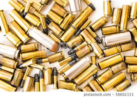 Bullet shells on a white background Bullet shells on a white background 38602151