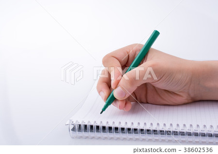 Hand writing on a Notebook 38602536