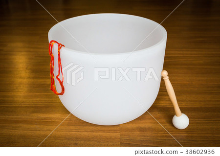 Big crystal singing bowl solo close up Big crystal singing bowl solo close up 38602936