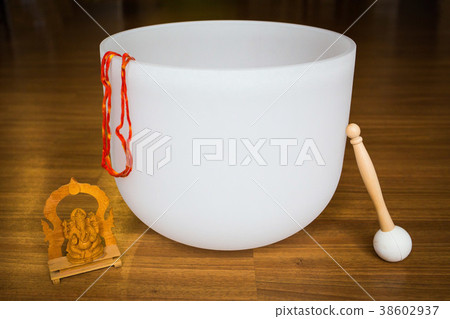 Big crystal singing bowl solo close up Big crystal singing bowl solo close up 38602937