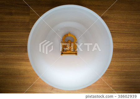 Big crystal singing bowl solo close up Big crystal singing bowl solo close up 38602939