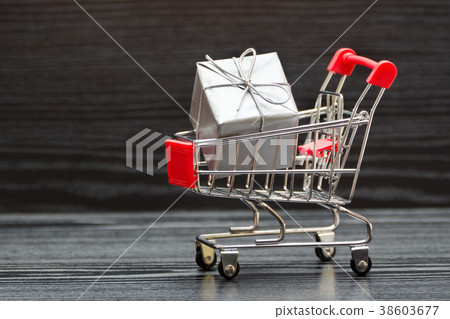 Shopping cart with gift boxes 38603677