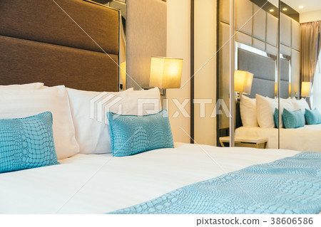 White pillow on the bed White pillow on the bed 38606586