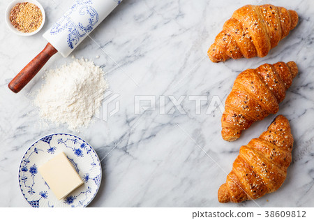 Croissants with baking ingredients Top view 38609812