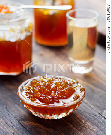 Orange, grapefruit confiture, jam in a glass jar 38610098
