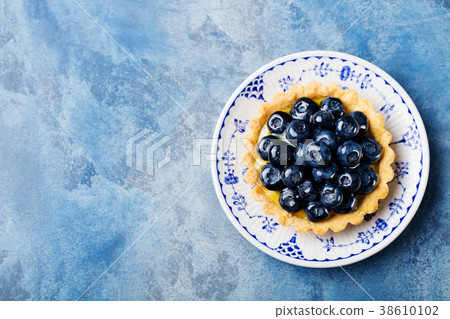 Blueberry tart, pie, tartlet with vanilla custard 38610102
