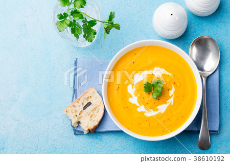 Pumpkin and carrot soup Top view. Copy space Pumpkin and carrot soup Top view. Copy space 38610192