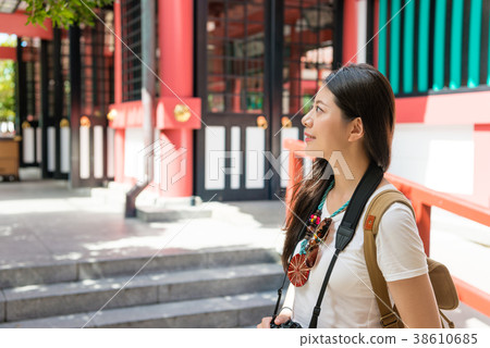 Smiling girl in Naminoue Shrine. Smiling girl in Naminoue Shrine. 38610685