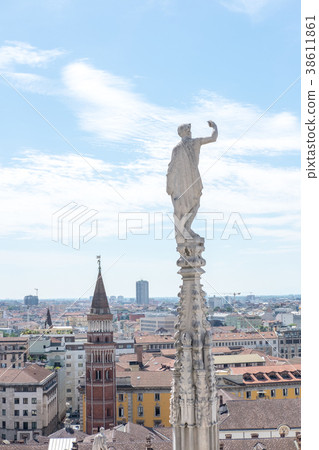 Gothic spire on the roof of Milan Duomo Gothic spire on the roof of Milan Duomo 38611861