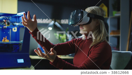 Laboratory employee working in VR glasses Laboratory employee working in VR glasses 38612666