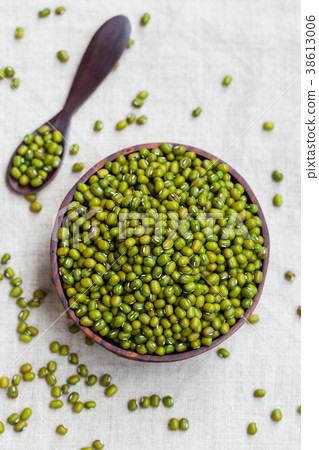 Mung bean, green moong dal in wooden bowl. 38613006