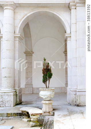 Courtyard of the temple with a flowerbed. Place 38613392