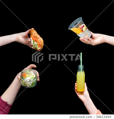 Hands holding healthy food, menu with microgreens 38613844