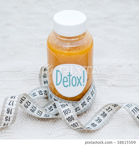 Detox drink with measuring tape. Free space for Detox drink with measuring tape. Free space for 38615509