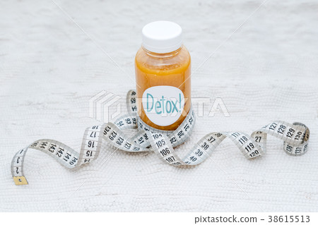 Detox drink with measuring tape. Free space for 38615513