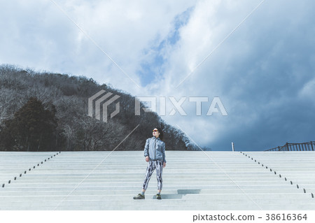 Sporty woman and sky 38616364