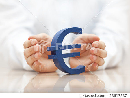 Euro sign protected by hands  38617887