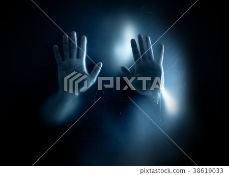 Shadowy figure trapped behind a scratched glass Shadowy figure trapped behind a scratched glass 38619033