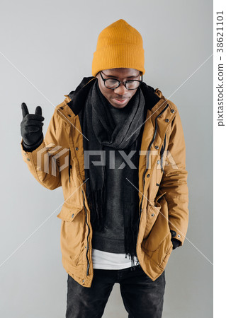 African-American man posing on gray background 38621101