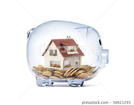 House on money inside transparent piggy bank 38621291