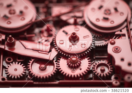 Red gears and cogs macro shot Red gears and cogs macro shot 38621520