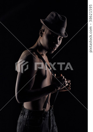 afro-american man in hat and suspenders afro-american man in hat and suspenders 38621595