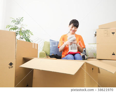 A woman preparing to move 38621970