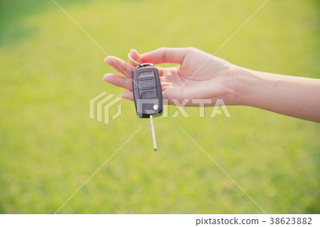 hand holding car key hand holding car key 38623882