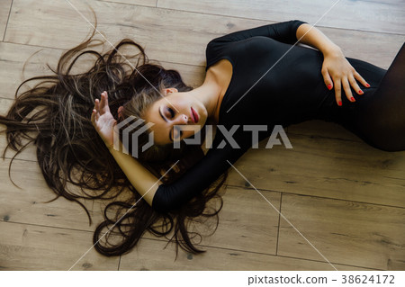 Beautiful young model ballet dancer lying inon 38624172