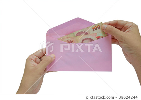 Hand putting Thai money in pink envelope 38624244