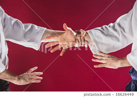 Two men fighting at Aikido training in martial Two men fighting at Aikido training in martial 38626449