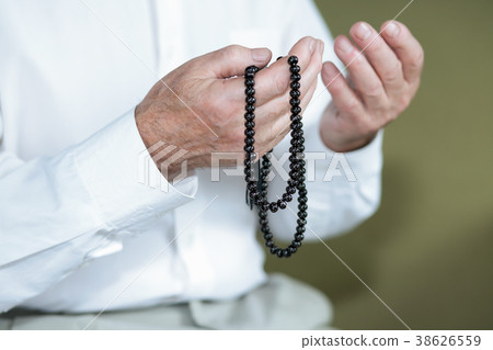 Praying hands of an old man Praying hands of an old man 38626559
