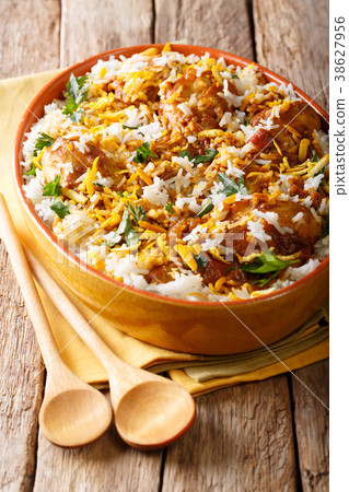 Delicious homemade biryani with chicken Delicious homemade biryani with chicken 38627956