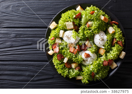 salad Lyonnaise with lettuce, bacon, crouton 38627975