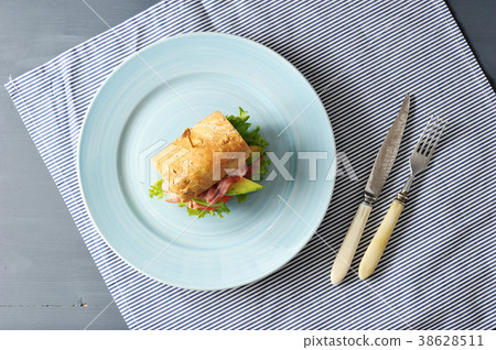 sandwich with bacon and avocado pierced sandwich with bacon and avocado pierced 38628511