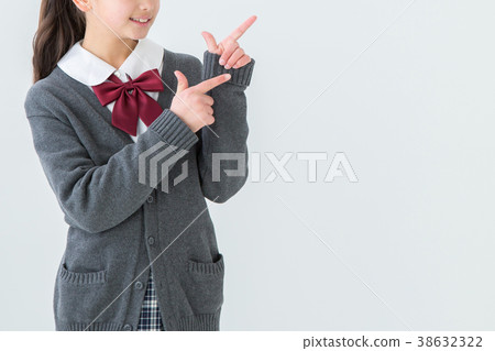 Girl in uniform who guides with both hands 38632322